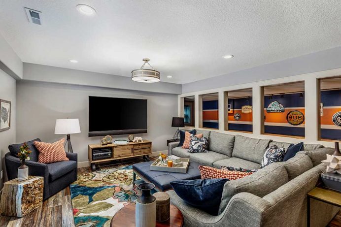 Basement Game Room Remodel with Gray Navy and Orange Decor