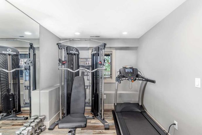 Basement Home Gym with Treadmill and Weights