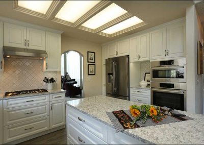 Off-White Colored Kitchen Remodel with Skylight and Traditional Design