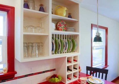 Portland Retro Kitchen with Bright Red Countertop and White Open Shelves