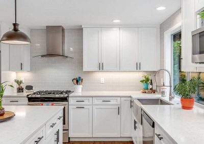 Portland Contemporary Kitchen with White Cabinets and Clean Design