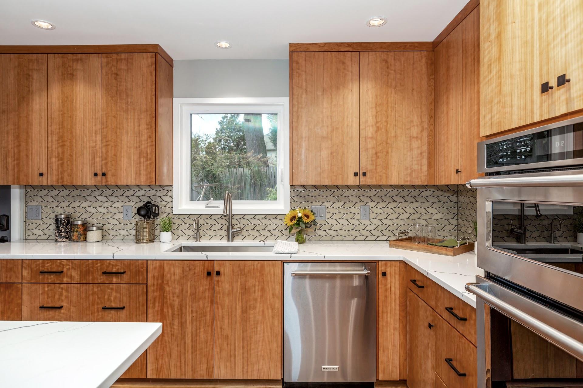 Mid-Century Modern Kitchen with Leaf Tile and Wooden Cabinets